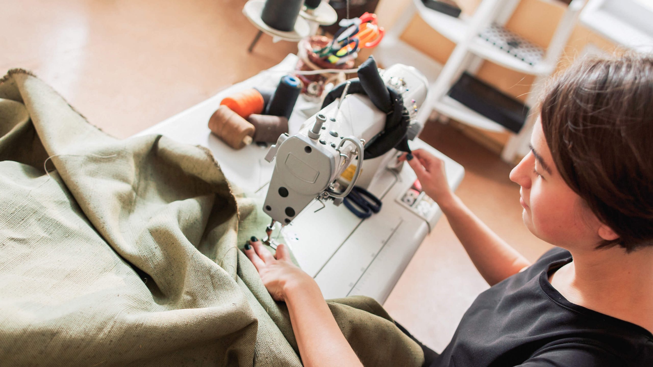 Seamstress working on fabric